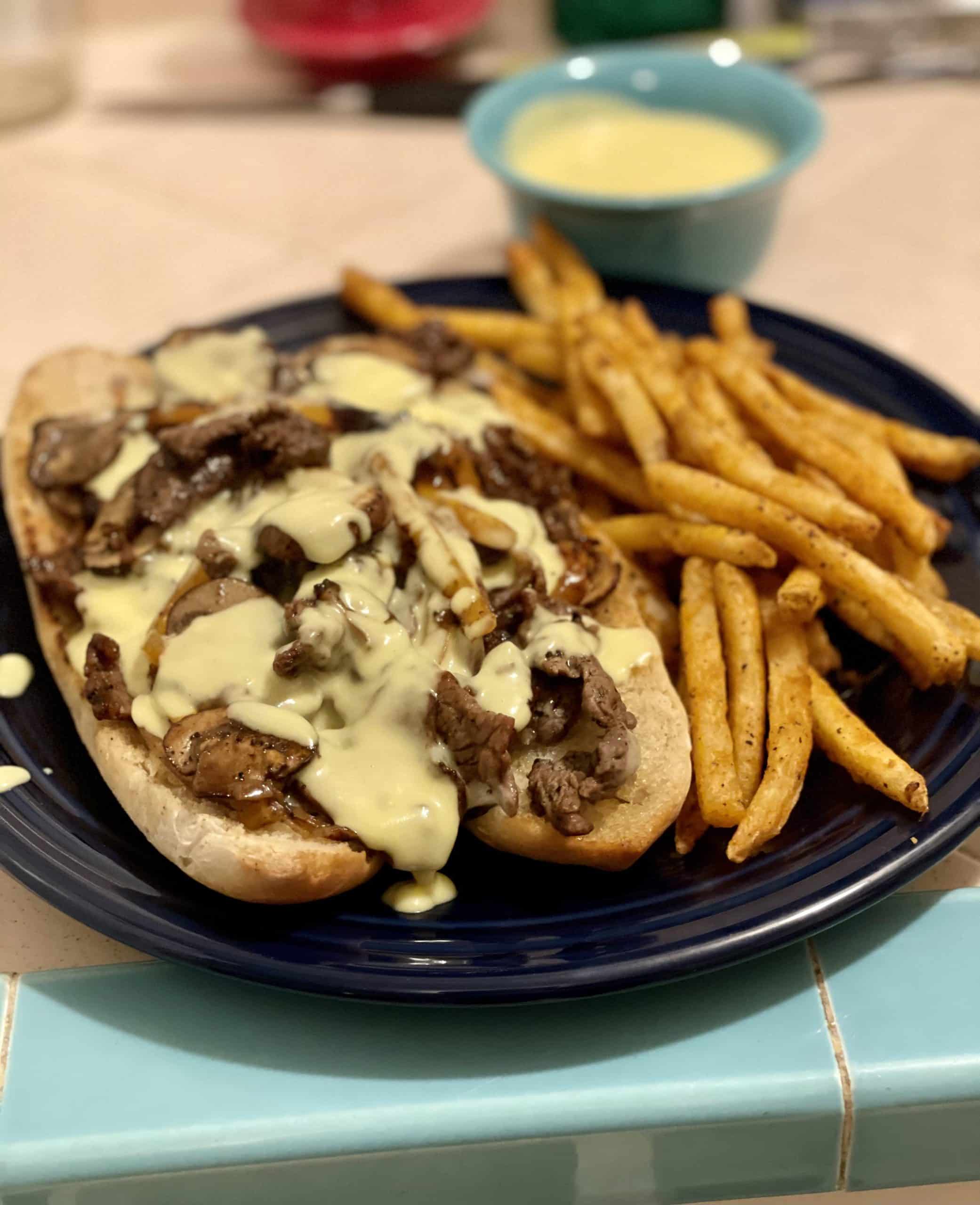 Homemade Philly Cheesesteak. Made the buns and cheese sauce from ...