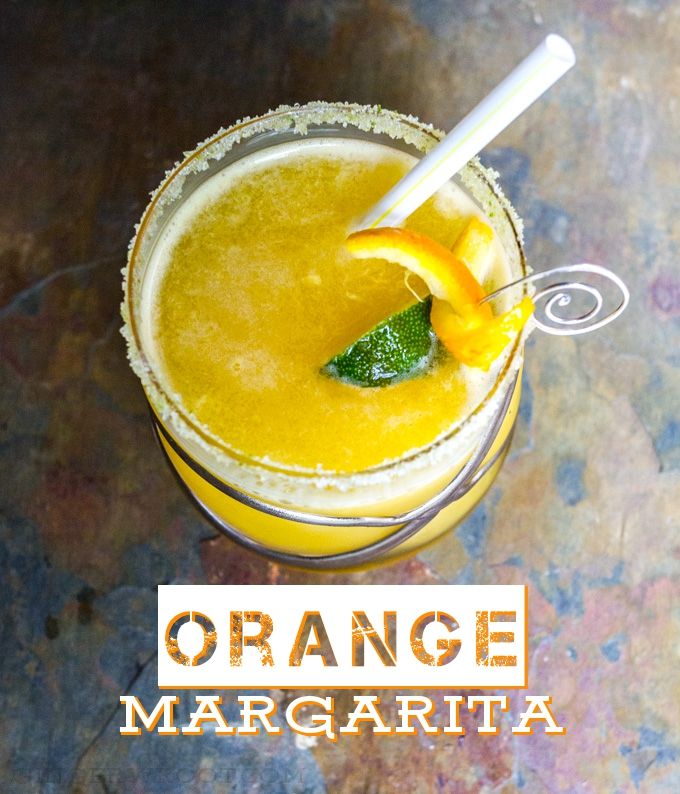 Orange Margarita made with oj, lime juice and tequila