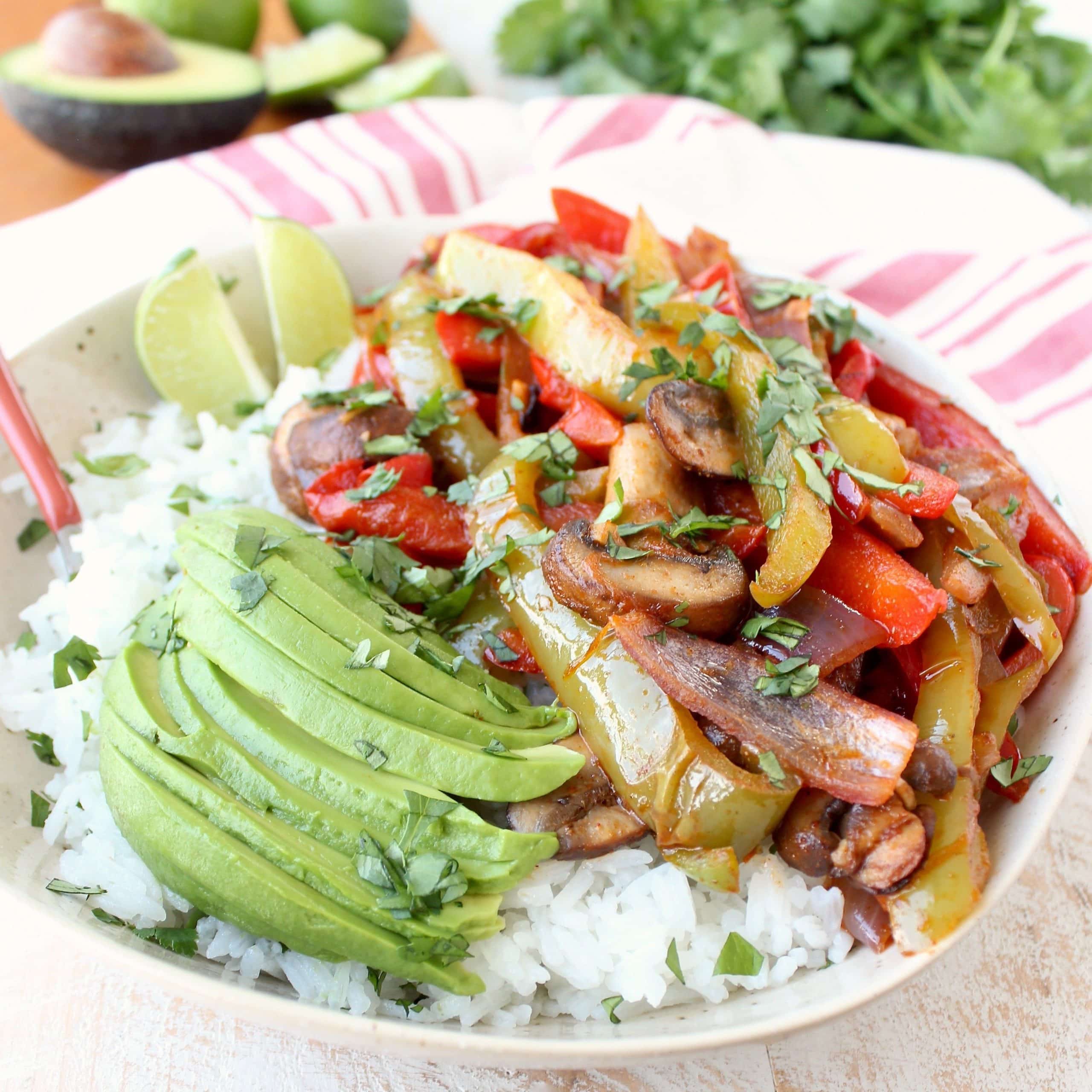 Sautéed, seasoned veggies are served on top of cilantro lime rice with ...