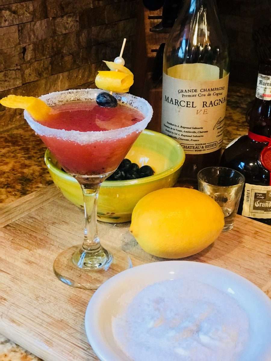 Sidecar Cocktail with Blueberries, cognac, Grand Marnier, lemon juice ...